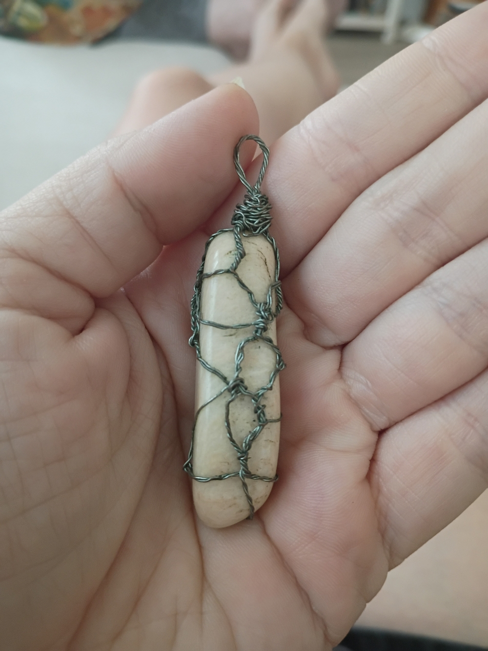 Handmade Cream Stone Pendant Wrapped in Dark Metal Wire